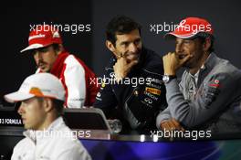 (L to R): Mark Webber (AUS) Red Bull Racing and Jenson Button (GBR) McLaren in the FIA Press Conference. 27.06.2013. Formula 1 World Championship, Rd 8, British Grand Prix, Silverstone, England, Preparation Day.