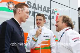 (L to R): Jordy Cobelens (NLD) CEO TW Steel with Paul di Resta (GBR) Sahara Force India F1 and Robert Fernley (GBR) Sahara Force India F1 Team Deputy Team Principal. 27.06.2013. Formula 1 World Championship, Rd 8, British Grand Prix, Silverstone, England, Preparation Day.