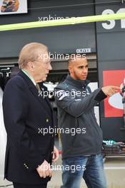 Lewis Hamilton (GBR) Mercedes AMG F1 with Sir David Frost (GBR) Broadcaster. 27.06.2013. Formula 1 World Championship, Rd 8, British Grand Prix, Silverstone, England, Preparation Day.