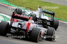 Lewis Hamilton (GBR) Mercedes AMG F1 W04 leads Daniel Ricciardo (AUS) Scuderia Toro Rosso STR8. 05.07.2013. Formula 1 World Championship, Rd 9, German Grand Prix, Nurburgring, Germany, Practice Day.