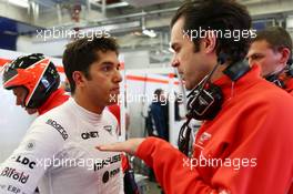 (L to R): Rodolfo Gonzalez (VEN) Marussia F1 Team Reserve Driver with Marc Hynes (GBR) Marussia F1 Team Driver Coach. 05.07.2013. Formula 1 World Championship, Rd 9, German Grand Prix, Nurburgring, Germany, Practice Day.