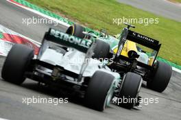 Charles Pic (FRA) Caterham CT03 leads Lewis Hamilton (GBR) Mercedes AMG F1 W04. 05.07.2013. Formula 1 World Championship, Rd 9, German Grand Prix, Nurburgring, Germany, Practice Day.