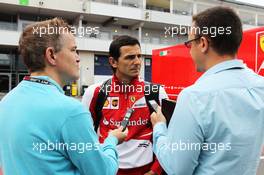 Pedro De La Rosa (ESP) Ferrari Development Driver and GPDA Chairman with Ian Parkes (GBR) Press Association Journalist (Left) and Jonathan Noble (GBR) Autosport Journalist (Right).. 05.07.2013. Formula 1 World Championship, Rd 9, German Grand Prix, Nurburgring, Germany, Practice Day.