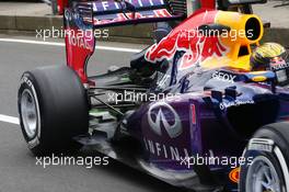 Sebastian Vettel (GER) Red Bull Racing RB9 running flow-vis paint on the rear wing. 05.07.2013. Formula 1 World Championship, Rd 9, German Grand Prix, Nurburgring, Germany, Practice Day.