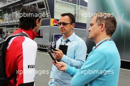 Pedro De La Rosa (ESP) Ferrari Development Driver and GPDA Chairman with Ian Parkes (GBR) Press Association Journalist (Right) and Jonathan Noble (GBR) Autosport Journalist (Centre). 05.07.2013. Formula 1 World Championship, Rd 9, German Grand Prix, Nurburgring, Germany, Practice Day.