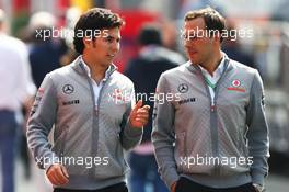 (L to R): Sergio Perez (MEX) McLaren with Gary Paffett (GBR) McLaren Test Driver. 05.07.2013. Formula 1 World Championship, Rd 9, German Grand Prix, Nurburgring, Germany, Practice Day.