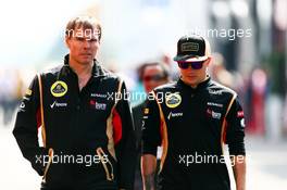 (L to R): Alan Permane (GBR) Lotus F1 Team Trackside Operations Director with Kimi Raikkonen (FIN) Lotus F1 Team. 05.07.2013. Formula 1 World Championship, Rd 9, German Grand Prix, Nurburgring, Germany, Practice Day.