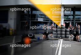 Lotus F1 Team mechanics, Pirelli tires  05.07.2013. Formula 1 World Championship, Rd 9, German Grand Prix, Nurburgring, Germany, Practice Day.