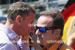 (L to R): David Coulthard (GBR) Red Bull Racing and Scuderia Toro Advisor / BBC Television Commentator with Rubens Barrichello (BRA). 07.07.2013. Formula 1 World Championship, Rd 9, German Grand Prix, Nurburgring, Germany, Race Day.