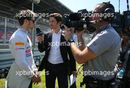 Romain Grosjean (FRA), Lotus F1 Team and Thomas Senecal (FRA), Canal+ tv 07.07.2013. Formula 1 World Championship, Rd 9, German Grand Prix, Nurburgring, Germany, Race Day.