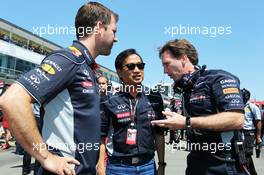 Christian Horner (GBR) Red Bull Racing Team Principal (Right) with Chalerm Yoovidhya (THA) Red Bull Racing Co-Owner (Centre). 07.07.2013. Formula 1 World Championship, Rd 9, German Grand Prix, Nurburgring, Germany, Race Day.
