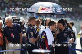 Sebastian Vettel (GER) Red Bull Racing with Guillaume Rocquelin (ITA) Red Bull Racing Race Engineer on the grid. 07.07.2013. Formula 1 World Championship, Rd 9, German Grand Prix, Nurburgring, Germany, Race Day.
