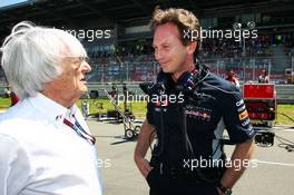 (L to R): Bernie Ecclestone (GBR) CEO Formula One Group (FOM) with Christian Horner (GBR) Red Bull Racing Team Principal on the grid. 07.07.2013. Formula 1 World Championship, Rd 9, German Grand Prix, Nurburgring, Germany, Race Day.