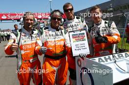 Sahara Force India F1 Team mechanics celebrate the Lions Rugby team's victory on the grid. 07.07.2013. Formula 1 World Championship, Rd 9, German Grand Prix, Nurburgring, Germany, Race Day.