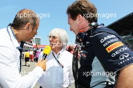 (L to R): Kai Ebel (GER) RTL TV Presenter with Bernie Ecclestone (GBR) CEO Formula One Group (FOM) and Christian Horner (GBR) Red Bull Racing Team Principal. 07.07.2013. Formula 1 World Championship, Rd 9, German Grand Prix, Nurburgring, Germany, Race Day.