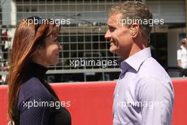 (L to R): Suzi Perry (GBR) BBC F1 Presenter with David Coulthard (GBR) Red Bull Racing and Scuderia Toro Advisor / BBC Television Commentator. 07.07.2013. Formula 1 World Championship, Rd 9, German Grand Prix, Nurburgring, Germany, Race Day.