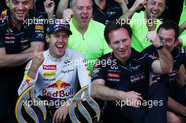 Race winner Sebastian Vettel (GER) Red Bull Racing celebrates with Christian Horner (GBR) Red Bull Racing Team Principal and the team. 07.07.2013. Formula 1 World Championship, Rd 9, German Grand Prix, Nurburgring, Germany, Race Day.