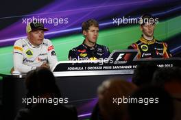 The FIA Press Conference (L to R): Kimi Raikkonen (FIN) Lotus F1 Team, second; Sebastian Vettel (GER) Red Bull Racing, race winner; Romain Grosjean (FRA) Lotus F1 Team, third. 07.07.2013. Formula 1 World Championship, Rd 9, German Grand Prix, Nurburgring, Germany, Race Day.