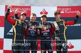 1st place Sebastian Vettel (GER) Red Bull Racing, 2nd place Kimi Raikkonen (FIN) Lotus F1 Team and 3rd place Romain Grosjean (FRA) Lotus F1 E21. 07.07.2013. Formula 1 World Championship, Rd 9, German Grand Prix, Nurburgring, Germany, Race Day.