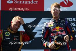 2nd place Kimi Raikkonen (FIN) Lotus F1 Team  with 1st place Sebastian Vettel (GER) Red Bull Racing  07.07.2013. Formula 1 World Championship, Rd 9, German Grand Prix, Nurburgring, Germany, Race Day.