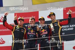 The podium (L to R): Kimi Raikkonen (FIN) Lotus F1 Team, second; Sebastian Vettel (GER) Red Bull Racing, race winner; Romain Grosjean (FRA) Lotus F1 Team, third.. 07.07.2013. Formula 1 World Championship, Rd 9, German Grand Prix, Nurburgring, Germany, Race Day.