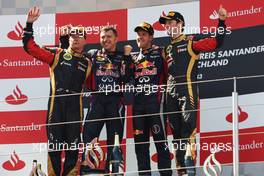 The podium (L to R): Kimi Raikkonen (FIN) Lotus F1 Team, second; Sebastian Vettel (GER) Red Bull Racing, race winner; Romain Grosjean (FRA) Lotus F1 Team, third.. 07.07.2013. Formula 1 World Championship, Rd 9, German Grand Prix, Nurburgring, Germany, Race Day.