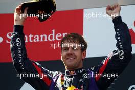 Race winner Sebastian Vettel (GER) Red Bull Racing celebrates on the podium. 07.07.2013. Formula 1 World Championship, Rd 9, German Grand Prix, Nurburgring, Germany, Race Day.