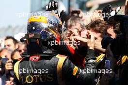 Romain Grosjean (FRA) Lotus F1 Team celebrates his third position in parc ferme. 07.07.2013. Formula 1 World Championship, Rd 9, German Grand Prix, Nurburgring, Germany, Race Day.