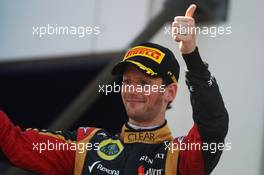 Romain Grosjean (FRA) Lotus F1 Team celebrates his third position on the podium. 07.07.2013. Formula 1 World Championship, Rd 9, German Grand Prix, Nurburgring, Germany, Race Day.