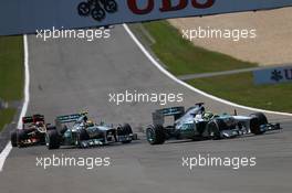 Nico Rosberg (GER) Mercedes AMG F1 W04 leads Lewis Hamilton (GBR) Mercedes AMG F1 W04. 07.07.2013. Formula 1 World Championship, Rd 9, German Grand Prix, Nurburgring, Germany, Race Day.