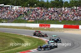 Nico Rosberg (GER) Mercedes AMG F1 W04 leads Lewis Hamilton (GBR) Mercedes AMG F1 W04 and Kimi Raikkonen (FIN) Lotus F1 E21. 07.07.2013. Formula 1 World Championship, Rd 9, German Grand Prix, Nurburgring, Germany, Race Day.
