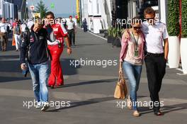 (L to R): Sebastian Vettel (GER) Red Bull Racing with Jessica Michibata (JPN) and her boyfriend Jenson Button (GBR) McLaren. 06.07.2013. Formula 1 World Championship, Rd 9, German Grand Prix, Nurburgring, Germany, Qualifying Day.