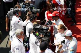 Nico Hulkenberg (GER) Sauber and Fernando Alonso (ESP) Ferrari with the media. 06.07.2013. Formula 1 World Championship, Rd 9, German Grand Prix, Nurburgring, Germany, Qualifying Day.