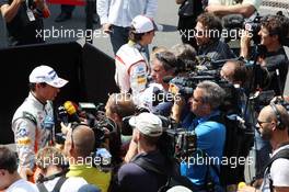Adrian Sutil (GER) Sahara Force India F1 and Esteban Gutierrez (MEX) Sauber with the media. 06.07.2013. Formula 1 World Championship, Rd 9, German Grand Prix, Nurburgring, Germany, Qualifying Day.