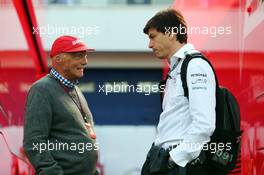 (L to R): Niki Lauda (AUT) Mercedes Non-Executive Chairman with Toto Wolff (GER) Mercedes AMG F1 Shareholder and Executive Director. 06.07.2013. Formula 1 World Championship, Rd 9, German Grand Prix, Nurburgring, Germany, Qualifying Day.