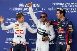 The top three qualifiers in Parc Ferme (L to R): Sebastian Vettel (GER) Red Bull Racing, second; Lewis Hamilton (GBR) Mercedes AMG F1, pole position; Mark Webber (AUS) Red Bull Racing, third. 06.07.2013. Formula 1 World Championship, Rd 9, German Grand Prix, Nurburgring, Germany, Qualifying Day.