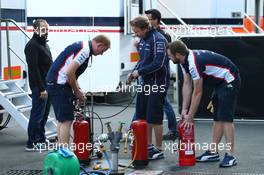 Firemen were called to the Williams garage after they suffered an incident with a KERS unit. 06.07.2013. Formula 1 World Championship, Rd 9, German Grand Prix, Nurburgring, Germany, Qualifying Day.
