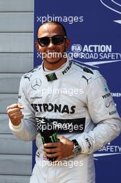 Lewis Hamilton (GBR) Mercedes AMG F1 celebrates his pole position in parc ferme. 06.07.2013. Formula 1 World Championship, Rd 9, German Grand Prix, Nurburgring, Germany, Qualifying Day.