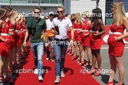 (L to R): Giedo van der Garde (NLD) Caterham F1 Team and Max Chilton (GBR) Marussia F1 Team on the drivers parade. 07.07.2013. Formula 1 World Championship, Rd 9, German Grand Prix, Nurburgring, Germany, Race Day.