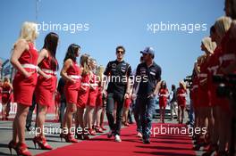 (L to R): Romain Grosjean (FRA) Lotus F1 Team and Daniel Ricciardo (AUS) Scuderia Toro Rosso on the drivers parade. 07.07.2013. Formula 1 World Championship, Rd 9, German Grand Prix, Nurburgring, Germany, Race Day.