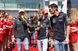 (L to R): Nico Rosberg (GER) Mercedes AMG F1, Sebastian Vettel (GER) Red Bull Racing, Jenson Button (GBR) McLaren and Mark Webber (AUS) Red Bull Racing on the drivers parade. 07.07.2013. Formula 1 World Championship, Rd 9, German Grand Prix, Nurburgring, Germany, Race Day.