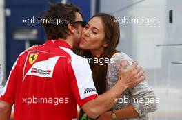 (L to R): Fernando Alonso (ESP) Ferrari with Jessica Michibata (JPN), girlfriend of Jenson Button (GBR) McLaren. 04.07.2013. Formula 1 World Championship, Rd 9, German Grand Prix, Nurburgring, Germany, Preparation Day.