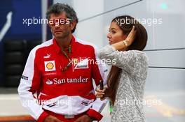 Jessica Michibata (JPN), girlfriend of Jenson Button (GBR) McLaren with Edoardo Bendinelli (ITA) Personal Trainer of Fernando Alonso (ESP) Ferrari. 04.07.2013. Formula 1 World Championship, Rd 9, German Grand Prix, Nurburgring, Germany, Preparation Day.