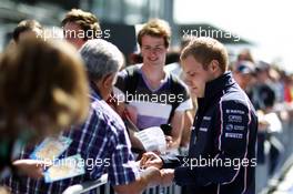 Valtteri Bottas (FIN) Williams signs autographs for the fans. 04.07.2013. Formula 1 World Championship, Rd 9, German Grand Prix, Nurburgring, Germany, Preparation Day.