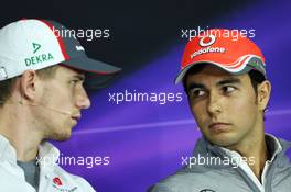 (L to R): Nelson Piquet Jr. (BRA) and Sergio Perez (MEX) McLaren in the FIA Press Conference. 04.07.2013. Formula 1 World Championship, Rd 9, German Grand Prix, Nurburgring, Germany, Preparation Day.
