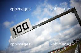 A 100 meter marker sign. 04.07.2013. Formula 1 World Championship, Rd 9, German Grand Prix, Nurburgring, Germany, Preparation Day.