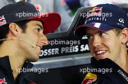 (L to R): Daniel Ricciardo (AUS) Scuderia Toro Rosso and Sebastian Vettel (GER) Red Bull Racing in the FIA Press Conference. 04.07.2013. Formula 1 World Championship, Rd 9, German Grand Prix, Nurburgring, Germany, Preparation Day.