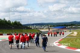 The Marussia F1 Team walk the circuit. 04.07.2013. Formula 1 World Championship, Rd 9, German Grand Prix, Nurburgring, Germany, Preparation Day.