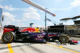 Mark Webber (AUS) Red Bull Racing RB9 leaves the pits. 26.07.2013. Formula 1 World Championship, Rd 10, Hungarian Grand Prix, Budapest, Hungary, Practice Day