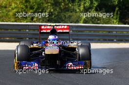 Daniel Ricciardo (AUS) Scuderia Toro Rosso STR8 locks up under braking. 26.07.2013. Formula 1 World Championship, Rd 10, Hungarian Grand Prix, Budapest, Hungary, Practice Day